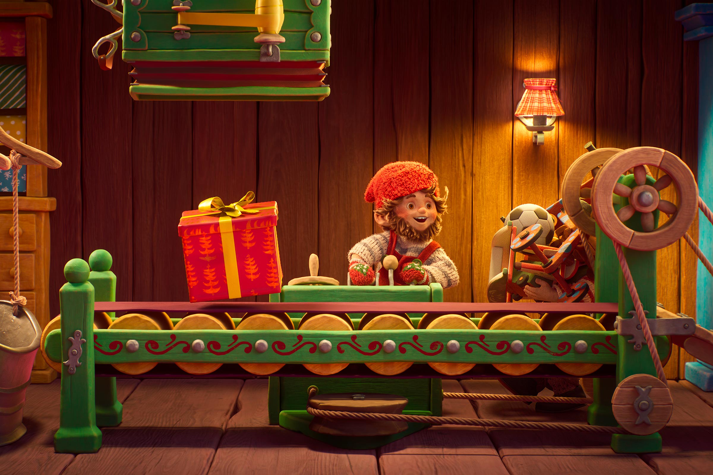 Ein Wichtel steht in der Weihnachtswerkstatt am Geschenke-Fließband